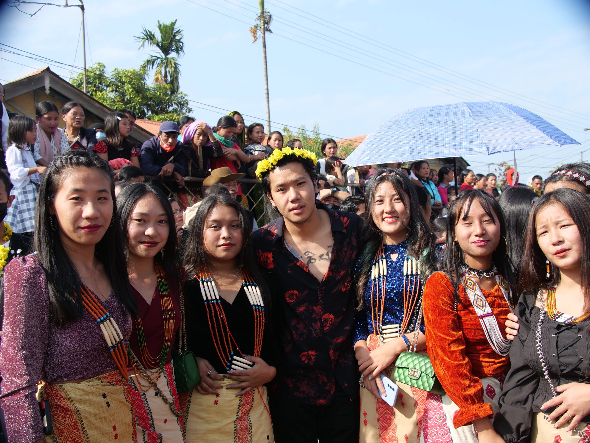 Community gathering in traditional dress
